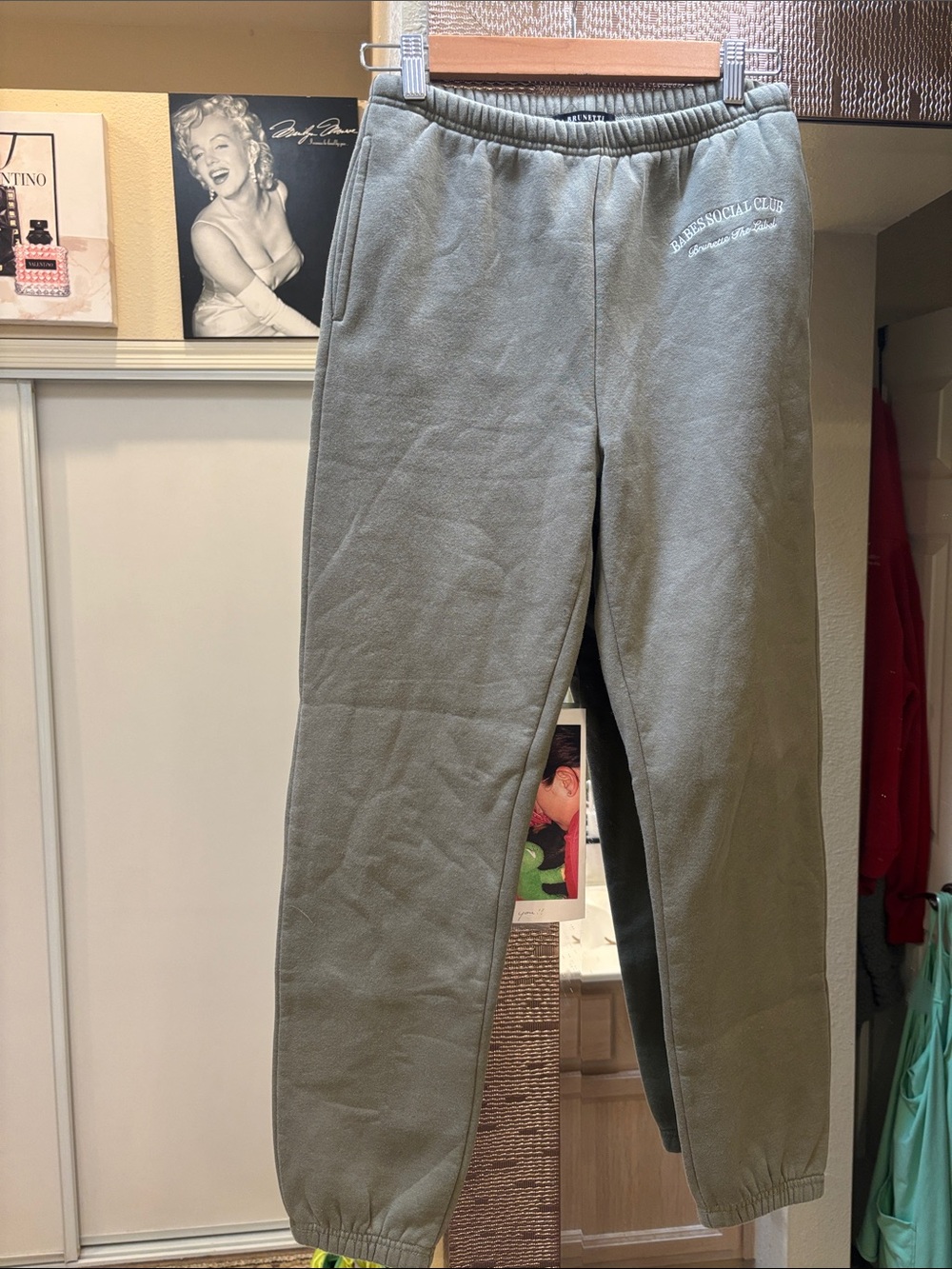 Brunette The Label Babes Social Club Olive Green Fleece Joggers.